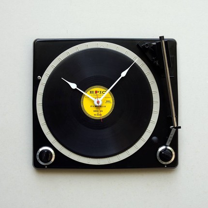 Clock made from a recycled console turntable